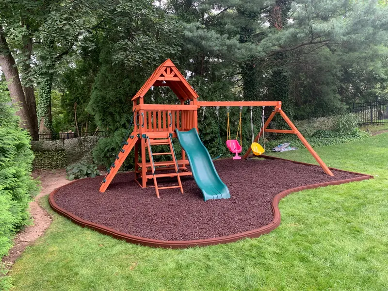 Nj Swing Set Installation With Rubber Mulch Safety Surfacing 1